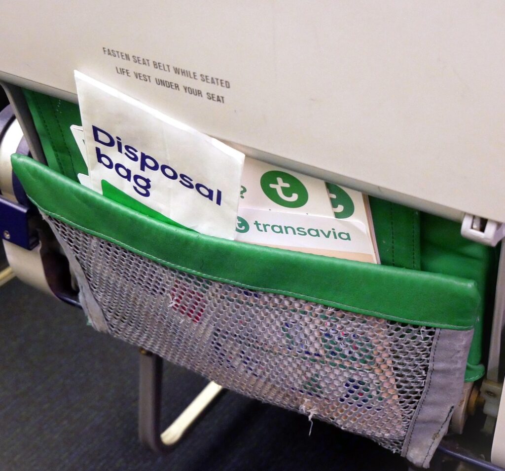 Our Amazon Travel Essentials plane, cabin seat, interior, seat, aisle, vomit bag, transavia, airline, airliner, flight, tourist class, seatbelt, instruction, vomit bag, vomit bag, vomit bag, vomit bag, vomit bag, seatbelt, seatbelt